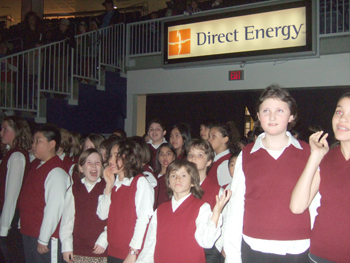 Dewson students sing O Canada at Ricoh Coliseum , Hockey Game . 011